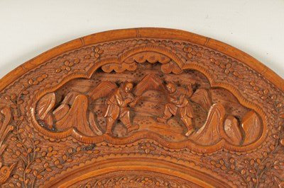 Lot 129 - A PAIR OF LATE 19TH CENTURY CHINESE CARVED BOXWOOD OVAL MIRRORS