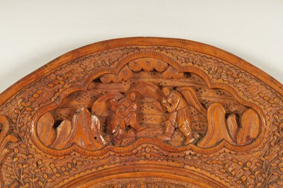 Lot 129 - A PAIR OF LATE 19TH CENTURY CHINESE CARVED BOXWOOD OVAL MIRRORS