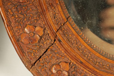 Lot 129 - A PAIR OF LATE 19TH CENTURY CHINESE CARVED BOXWOOD OVAL MIRRORS