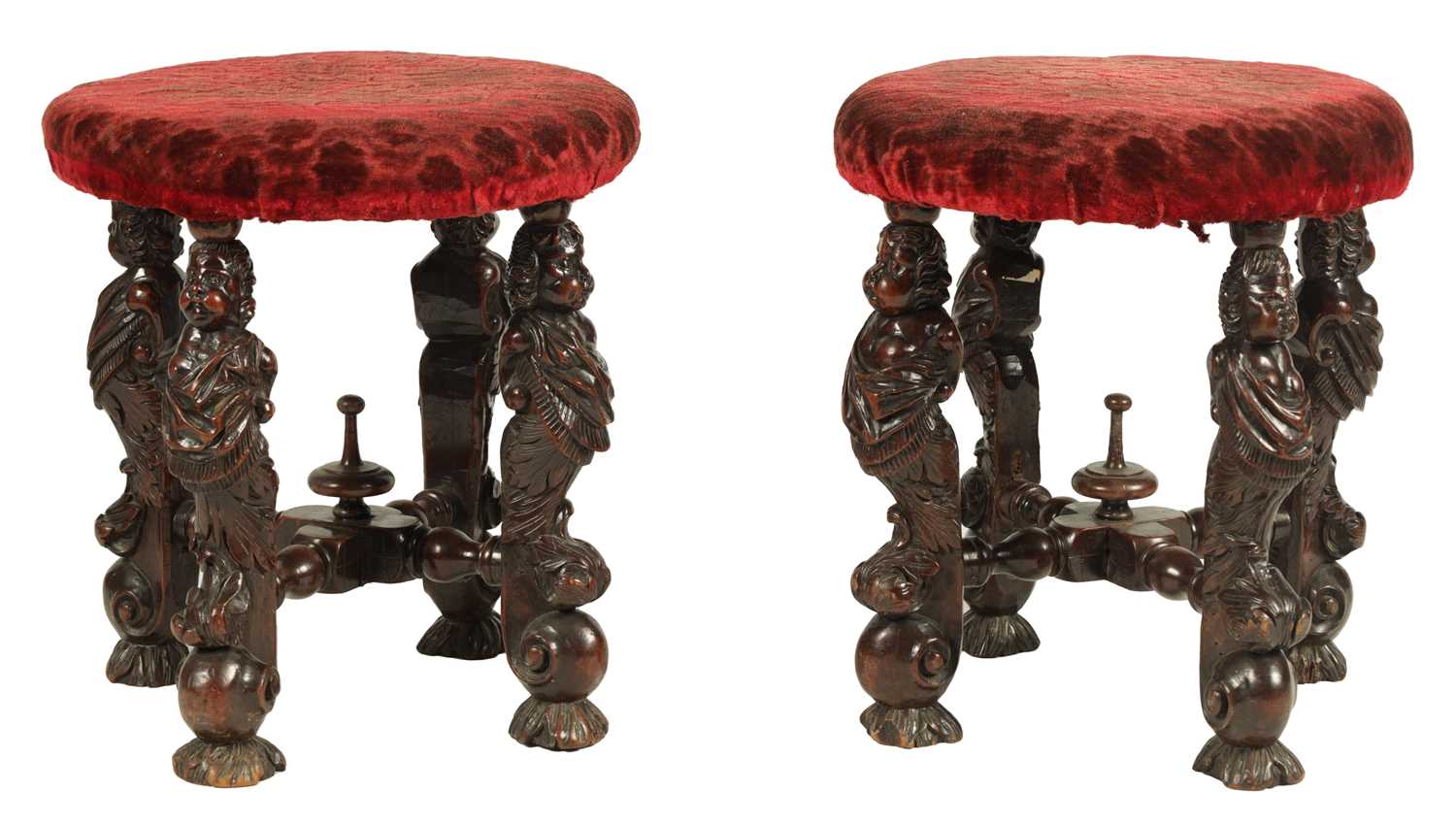 Lot 1081 - A GOOD PAIR OF CHARLES II CARVED WALNUT CIRCULAR UPHOLSTERED STOOLS