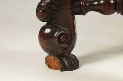 Lot 1081 - A GOOD PAIR OF CHARLES II CARVED WALNUT CIRCULAR UPHOLSTERED STOOLS