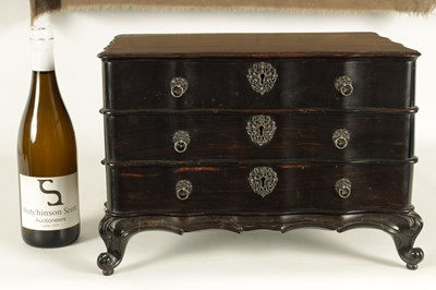 Lot 117 - A GOOD 19TH CENTURY ANGLO INDIAN EBONY MINIATURE COMMODE