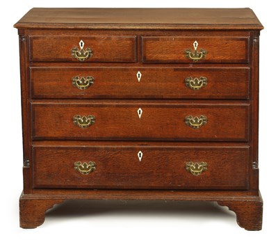 Lot 754 - A GEORGE III WALNUT CROSS-BANDED OAK CHEST OF DRAWERS