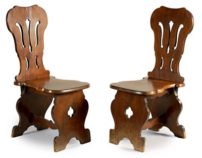 Lot 701 - A PAIR OF EARLY GEORGE III MAHOGANY 'SGABELLO' TYPE HALL CHAIRS