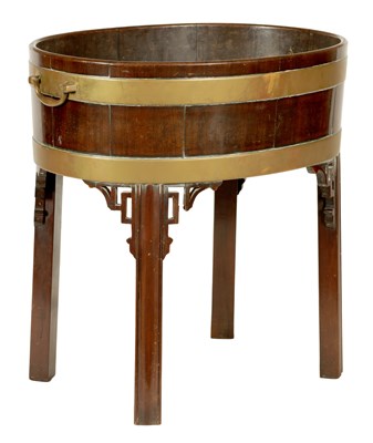 Lot 720 - A GOOD GEORGE III MAHOGANY CHIPPENDALE STYLE OVAL WINE COOLER ON STAND