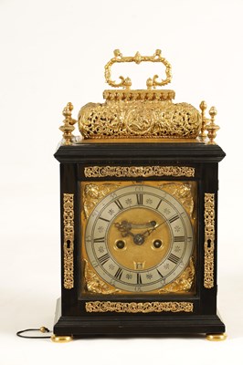 Lot 524 - JOSEPH WINDMILLS, LONDON. A FINE WILLIAM AND MARY EBONY VENEERED GILT BRASS MOUNTED BASKET TOP BRACKET CLOCK