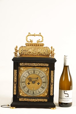 Lot 524 - JOSEPH WINDMILLS, LONDON. A FINE WILLIAM AND MARY EBONY VENEERED GILT BRASS MOUNTED BASKET TOP BRACKET CLOCK