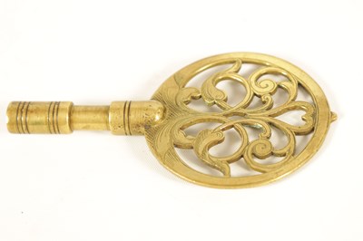 Lot 524 - JOSEPH WINDMILLS, LONDON. A FINE WILLIAM AND MARY EBONY VENEERED GILT BRASS MOUNTED BASKET TOP BRACKET CLOCK