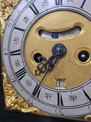 Lot 524 - JOSEPH WINDMILLS, LONDON. A FINE WILLIAM AND MARY EBONY VENEERED GILT BRASS MOUNTED BASKET TOP BRACKET CLOCK