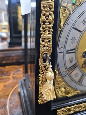 Lot 524 - JOSEPH WINDMILLS, LONDON. A FINE WILLIAM AND MARY EBONY VENEERED GILT BRASS MOUNTED BASKET TOP BRACKET CLOCK