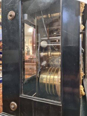 Lot 524 - JOSEPH WINDMILLS, LONDON. A FINE WILLIAM AND MARY EBONY VENEERED GILT BRASS MOUNTED BASKET TOP BRACKET CLOCK
