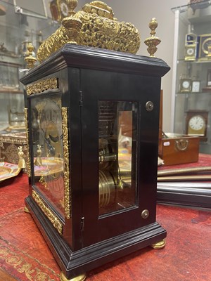Lot 524 - JOSEPH WINDMILLS, LONDON. A FINE WILLIAM AND MARY EBONY VENEERED GILT BRASS MOUNTED BASKET TOP BRACKET CLOCK
