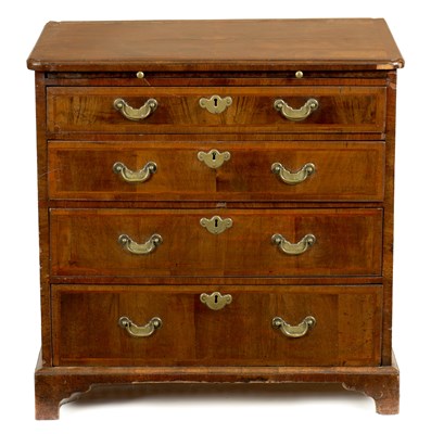 Lot 732 - A GEORGE I FIGURED WALNUT CHEST OF DRAWERS