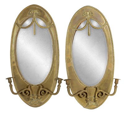 Lot 702 - AN UNUSUAL PAIR OF 19TH CENTURY BRASS OVAL SHAPED ADAM STYLE GIRANDOLE MIRRORS