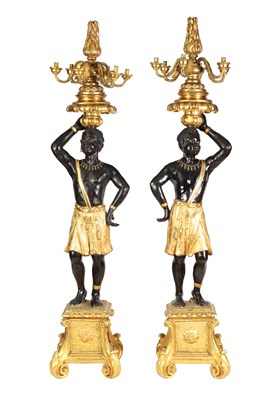 Lot 686 - A FINE PAIR OF 18TH CENTURY CARVED GILT GESSO AND POLYCHROME PAINTED BLACKAMOOR TORCHERES OF LARGE SIZE