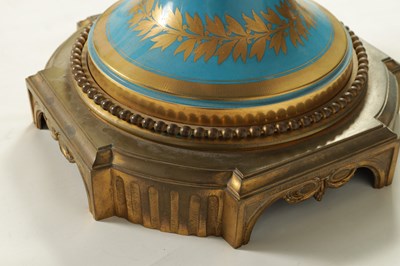 Lot 603 - A FINE AND MONUMENTAL PAIR OF FRENCH 19TH CENTURY GILT OROMLU AND SERVES PORCELAIN FLOOR STANDING VASE SHAPED CANDELABRA