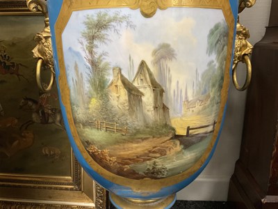 Lot 603 - A FINE AND MONUMENTAL PAIR OF FRENCH 19TH CENTURY GILT OROMLU AND SERVES PORCELAIN FLOOR STANDING VASE SHAPED CANDELABRA