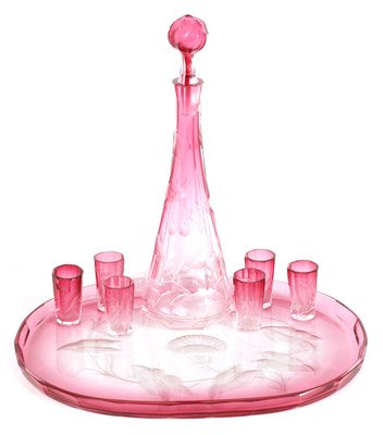 Lot 13 - AN ART NOUVEAU RUBY AND CLEAR GLASS MOSER DECANTER, TRAY AND SIX GLASSES