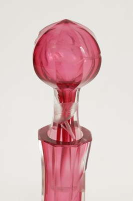 Lot 31 - AN ART NOUVEAU RUBY AND CLEAR GLASS MOSER DECANTER, TRAY AND SIX GLASSES