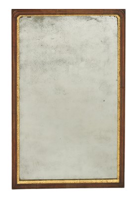 Lot 697 - A GEORGE II WALNUT MOULDED HANGING MIRROR
