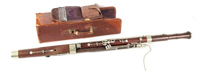 Lot 106 - AN EARLY 20TH CENTURY HAWKES & SON LONDON, EXCELSIOR SONORUS CLASS HARDWOOD BASSOON