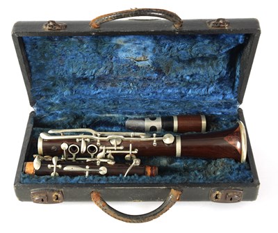 Lot 102 - A VINTAGE ROSEWOOD CLARINET