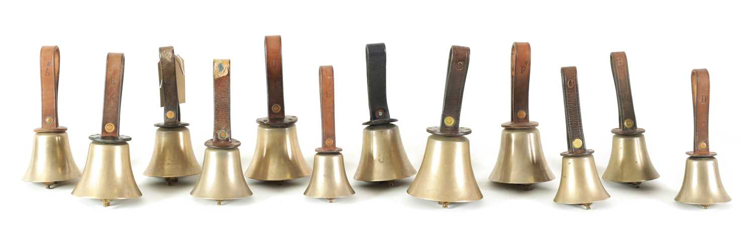 Lot 147 - A SET OF 12 HAND BELLS SIGNED WARNER, LONDON