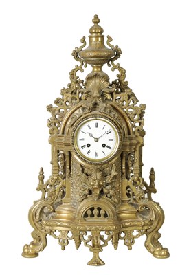 Lot 794 - A LATE 19TH CENTURY FRENCH ORNATE AND PIERCED BRASS MANTEL CLOCK OF LARGE SIZE