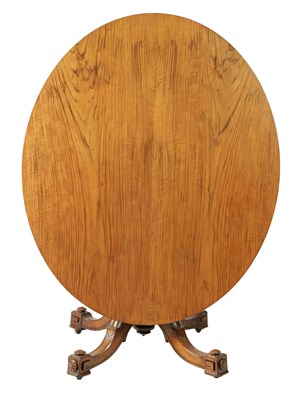 Lot 1328 - GILLOW LANCASTER, A MID-VICTORIAN FIGURED WALNUT OVAL TILT TOP CENTRE TABLE