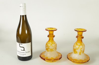 Lot 23 - A FINE PAIR OF 19TH CENTURY BOHEMIAN AMBER FLASHED GLASS DECANTERS