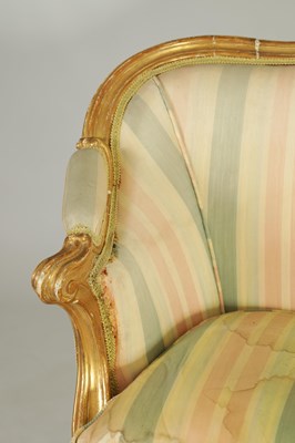 Lot 1399 - A PAIR OF GEORGE III ENGLISH CARVED GILTWOOD HEPPLEWHITE STYLE UPHOLSTERED SETTEES