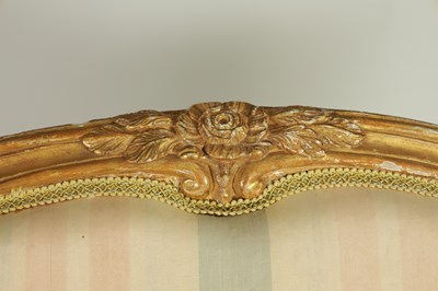 Lot 1399 - A PAIR OF GEORGE III ENGLISH CARVED GILTWOOD HEPPLEWHITE STYLE UPHOLSTERED SETTEES