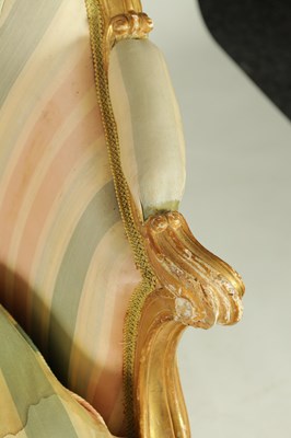 Lot 1399 - A PAIR OF GEORGE III ENGLISH CARVED GILTWOOD HEPPLEWHITE STYLE UPHOLSTERED SETTEES
