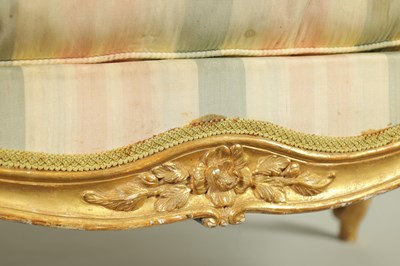 Lot 1399 - A PAIR OF GEORGE III ENGLISH CARVED GILTWOOD HEPPLEWHITE STYLE UPHOLSTERED SETTEES