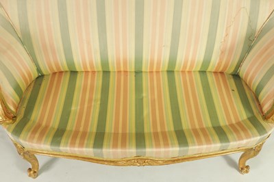 Lot 1399 - A PAIR OF GEORGE III ENGLISH CARVED GILTWOOD HEPPLEWHITE STYLE UPHOLSTERED SETTEES