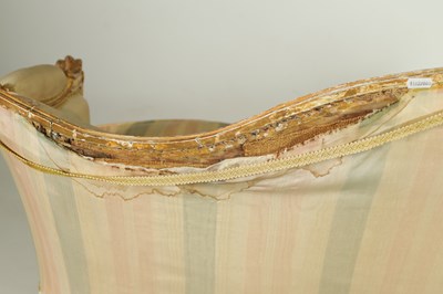 Lot 1399 - A PAIR OF GEORGE III ENGLISH CARVED GILTWOOD HEPPLEWHITE STYLE UPHOLSTERED SETTEES
