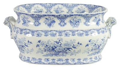Lot 59 - A LARGE EARLY 19TH CENTURY BLUE AND WHITE GLAZED POTTERY FOOT BATH