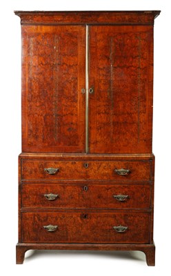 Lot 1434 - A GEORGE I HERRING-BANDED BURR WALNUT CABINET ON CHEST