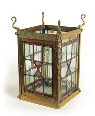 Lot 611 - A LATE 19TH CENTURY BRASS AND STAINED GLASS HALL LANTERN