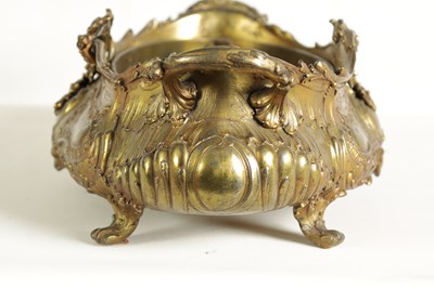 Lot 609 - A 19TH CENTURY FRENCH CAST GILT METAL RECOCO STYLE OVAL TWO-HANDLED SHALLOW JARDINERE AND LINER