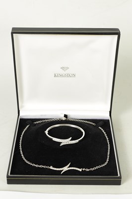 Lot 397 - AN 18CT WHITE GOLD DIAMOND NECKLACE AND BANGLE SET
