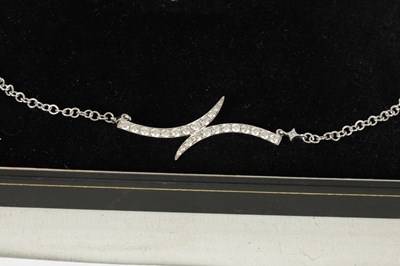 Lot 397 - AN 18CT WHITE GOLD DIAMOND NECKLACE AND BANGLE SET