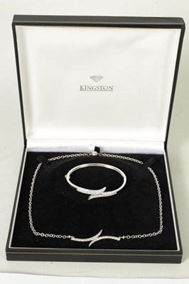 Lot 397 - AN 18CT WHITE GOLD DIAMOND NECKLACE AND BANGLE SET