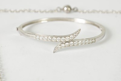 Lot 397 - AN 18CT WHITE GOLD DIAMOND NECKLACE AND BANGLE SET