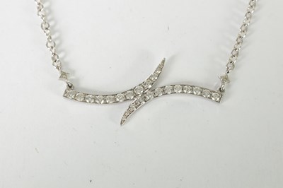 Lot 397 - AN 18CT WHITE GOLD DIAMOND NECKLACE AND BANGLE SET