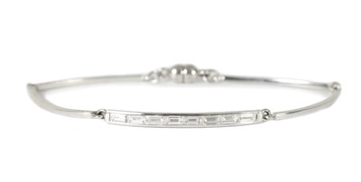 Lot 428 - A 14CT WHITE GOLD BAGUETTE CUT DIAMOND BRACELET