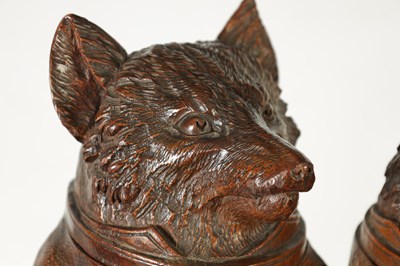 Lot 757 - A LARGE AND RARE 19TH CENTURY BLACK FOREST CARVED LINDEN WOOD TOBACCO JAR FORMED AS A FOX AND HARE
