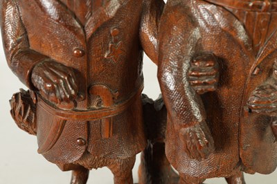 Lot 757 - A LARGE AND RARE 19TH CENTURY BLACK FOREST CARVED LINDEN WOOD TOBACCO JAR FORMED AS A FOX AND HARE