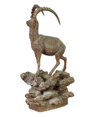 Lot 751 - A 19TH CENTURY CARVED LINDEN WOOD BLACK FOREST SCULPTURE