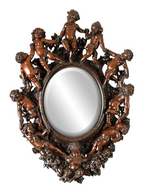 Lot 1478 - A FINE 19TH CENTURY ITALIAN CARVED WALNUT HANGING MIRROR